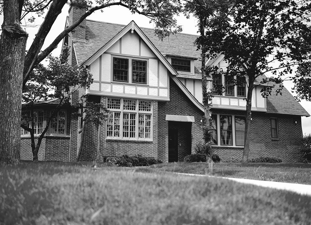 The exterior of the Kays House in black and white.