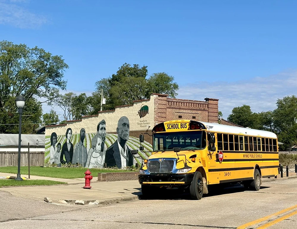 School bus in front of the Southern Tenant Farmers Museum.