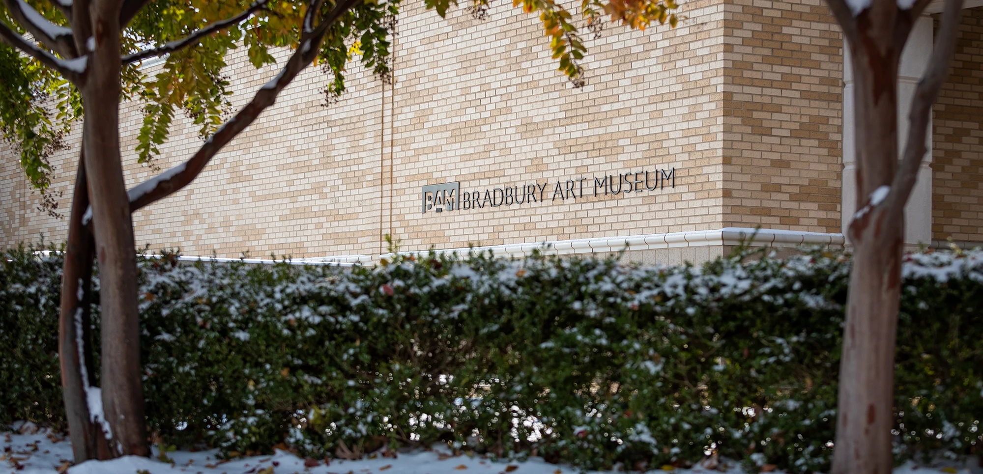 The exterior of the Bradbury Art Museum in winter.