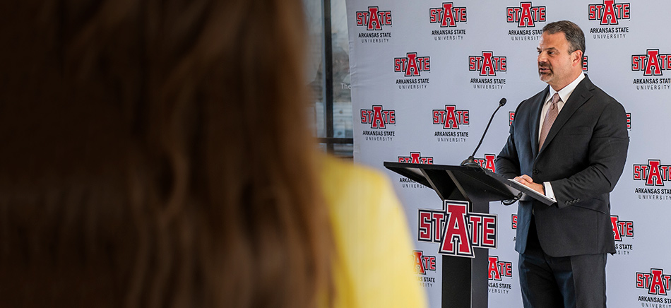 Chancellor Todd Shields at the podium during the press conference