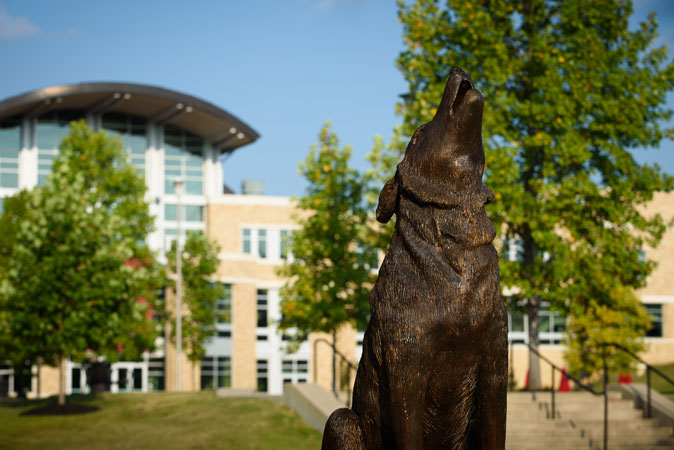 The red wolf statue in front of the student union.